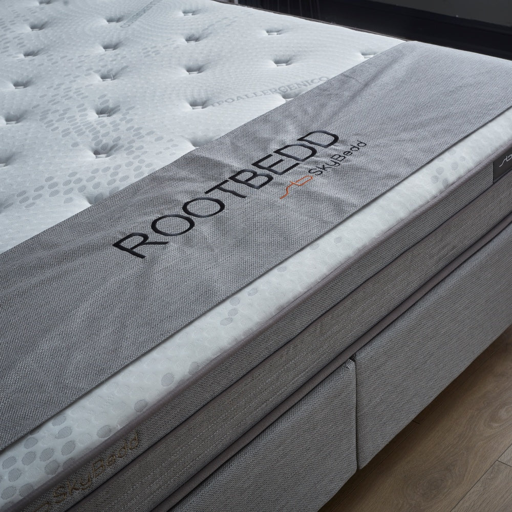 Boxspringbett / Stauraumbett "RootBedd" Skybedd in Grau mit Matratze und integriertem Stauraum